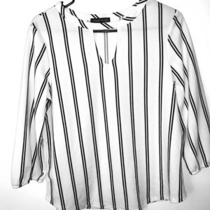white dress top with black stripes and cut out